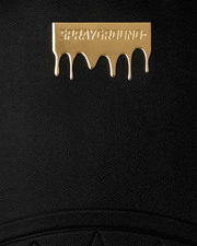 Sprayground gold drip backpack by SPRAYGROUND