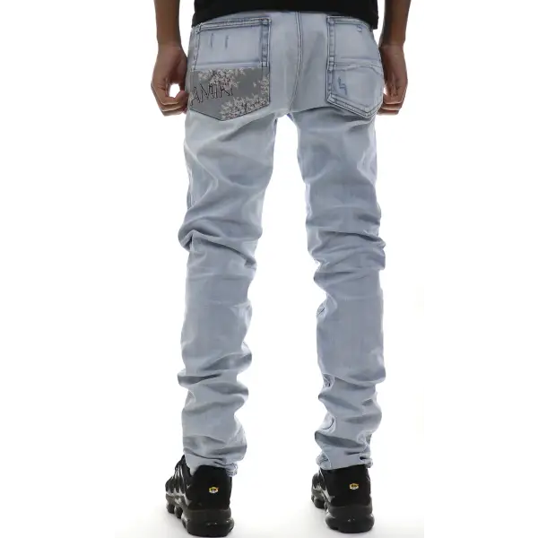 Amiri Hibiscus Artpatch Skinny Jeans - ECtrendsetters