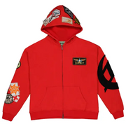 Red hoodie with patches and a large black symbol on a white background