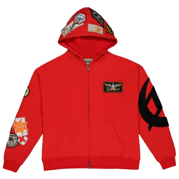 Red hoodie with patches and a large black symbol on a white background