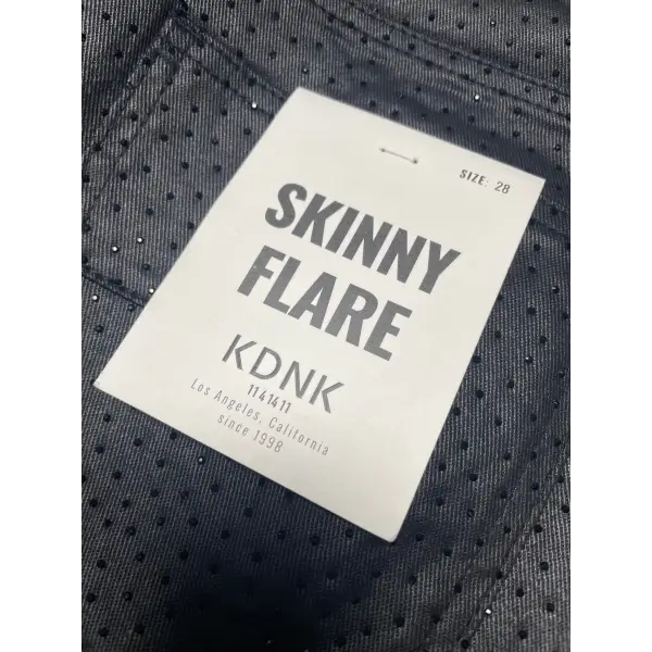 KDNK studded out leather coated denim - DENIM