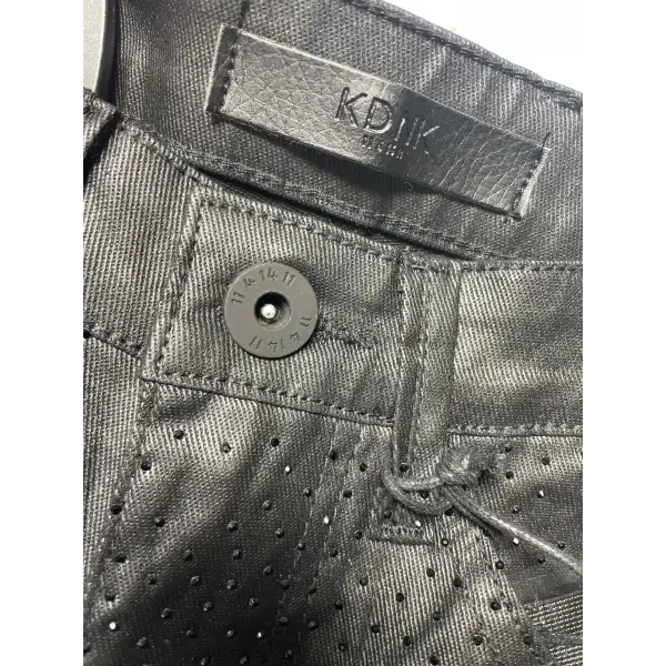 KDNK studded out leather coated denim - DENIM